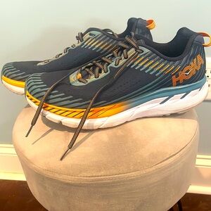 Men’s Hoka sneakers, size 10.5, orange and blue in color.